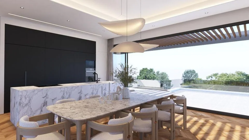 Render of the kitchen and dining area opening onto the terrace and sea view
