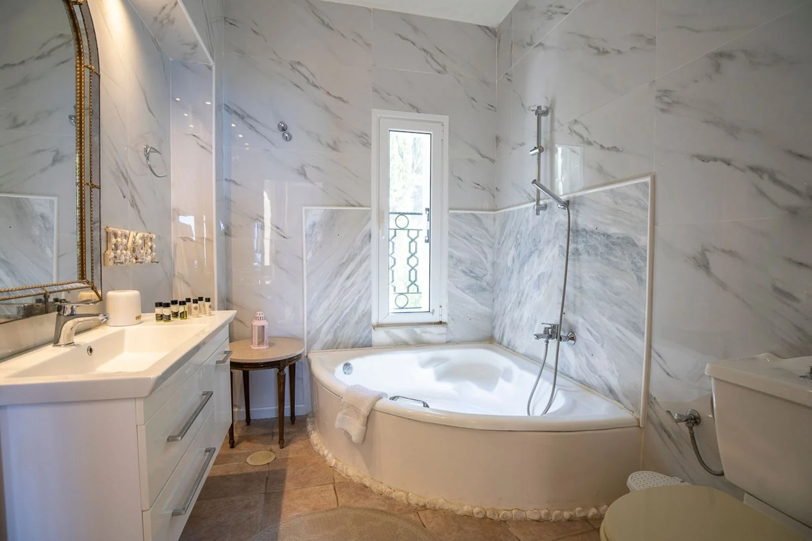 Marble bathroom with corner bath, Corfu villa